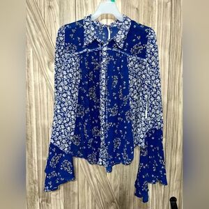Free People Serena Printed Blouse in blue combo with a neck tie detail and bell-